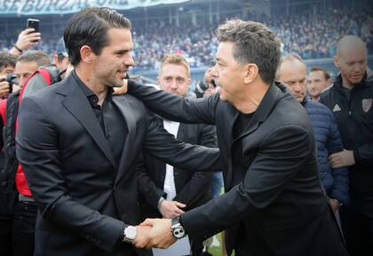 Fernando Gago y Marcelo Gallardo, en un Racing vs. River; ahora se enfrentarán en el superclásico.