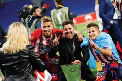 Festejo de título con dos de sus tres hijos varones: Gianluca y Giuliano; falta el mayor, Giovanni, que juega en Fiorentina
