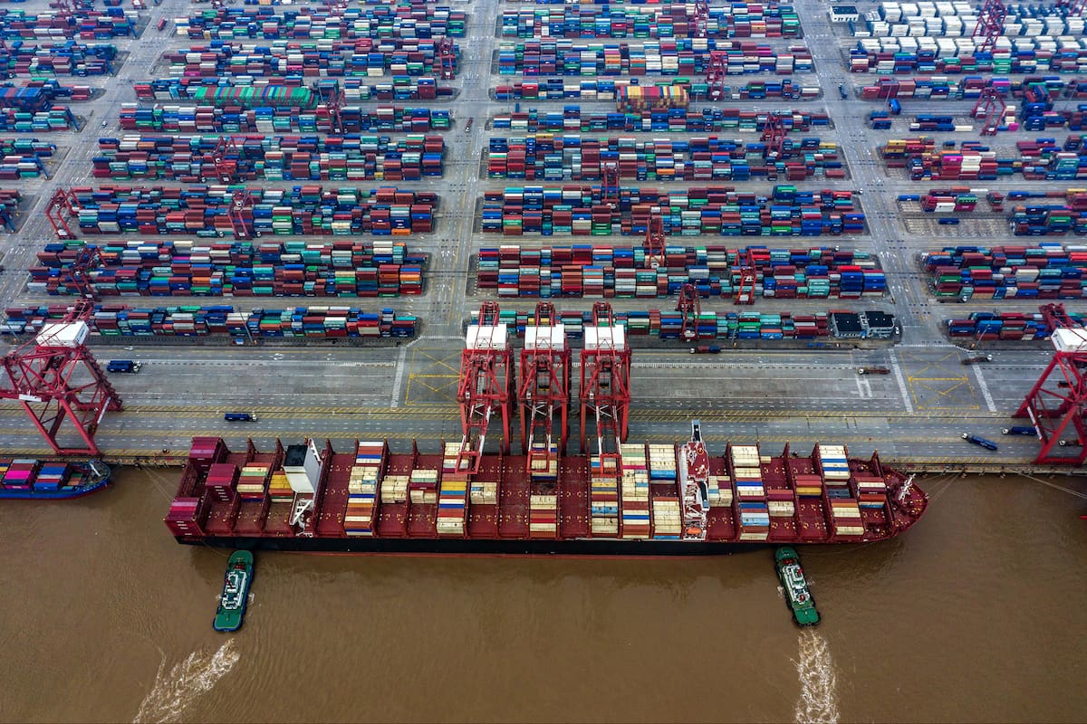 FILE -- A giant container ship docked at the Yangshan Port in Shanghai, China, May 27, 2019. As container ships have grown larger, many ports and canals have not made adjustments to accommodate them. Four months after the megaship Ever Given got stuck in the canal, neither the canal nor the shipping industry has addressed some of the most critical issues that led to the grounding. (Lam Yik Fei/The New York Times)
