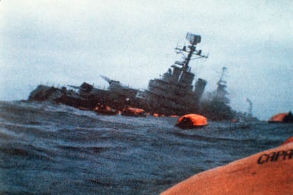 ** FILE ** The Argentinian cruiser General Belgrano sinks amid orange life rafts holding survivors in the South Atlantic Ocean, after being torpedoed by the British Royal Navy in this May 1, 1982 file photo. April 2 marks the 25th anniversary of the beginning of the war between Argentina and Great Britain over the possession of the islands, known as Malvinas by Argentines. The 10-week war killed 712 Argentines, 255 Britons and three islanders. (AP Photo/ File)
