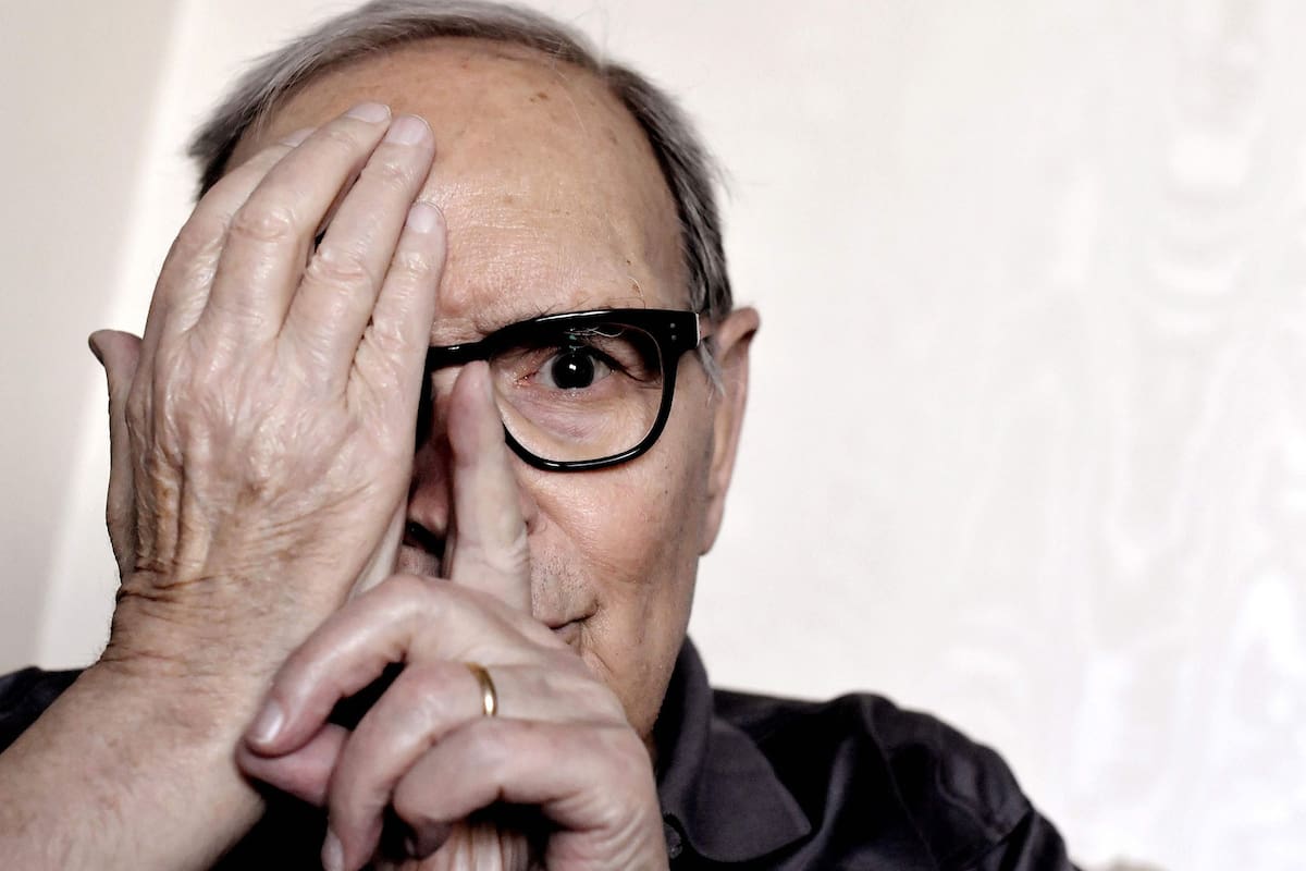 (FILES) In this file photo taken on July 03, 2017 Italian composer Ennio Morricone poses during an interview in Rome. - Ennio Morricone, one of the world's best-known and most prolific film composers, has died in Rome, Italian media reported on July 6, 2020. (Photo by TIZIANA FABI / AFP)