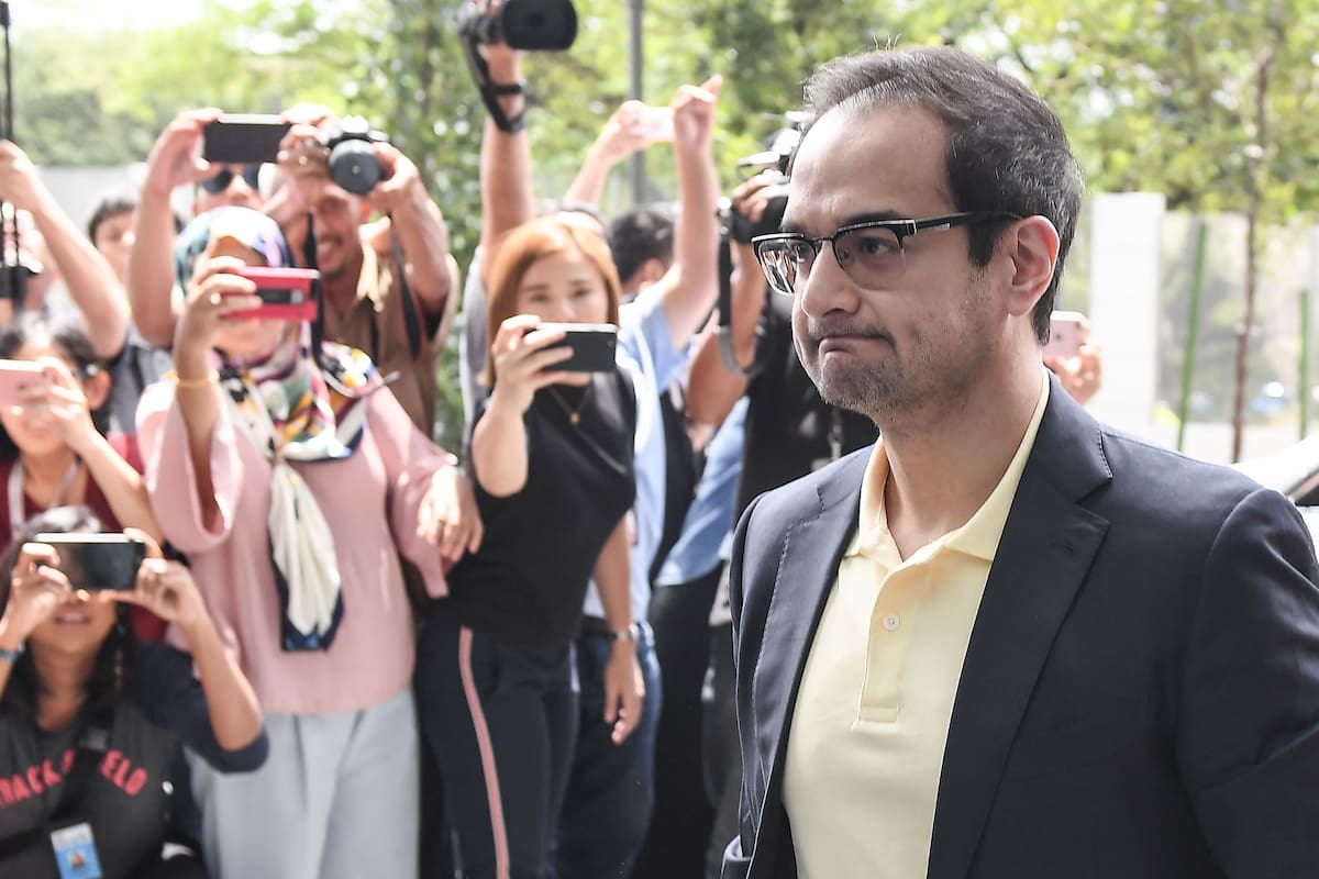 (FILES) In this file photo taken on July 03, 2018, former Malaysian prime minister Najib Razaks stepson Riza Aziz arrives to give a statement at the Malaysian Anti-Corruption Commission headquarters in Putrajaya, outside Kuala Lumpur. - The Malaysian producer of the Leonardo DiCaprio-starred film &a