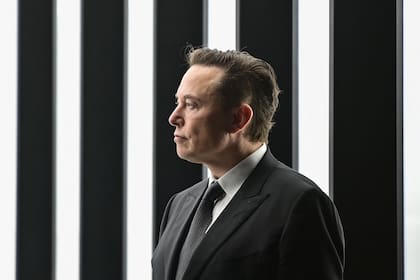 (FILES) In this file photo taken on March 22, 2022 Tesla CEO Elon Musk is pictured as he attends the start of the production at Tesla's "Gigafactory" on March 22, 2022 in Gruenheide, southeast of Berlin. - Elon Musk took control of Twitter and fired its top executives, US media reported late October 27, 2022, in a deal that puts one of the top platforms for global discourse in the hands of the world's richest man. Musk sacked chief executive Parag Agrawal, as well as the company's chief financial officer and its head of legal policy, trust and safety, the Washington Post and CNBC reported citing unnamed sources. (Photo by Patrick Pleul / POOL / AFP)