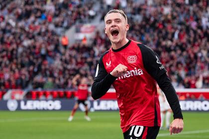 Florian Wirtz del Bayer Leverkusen celebra tras anotar en el encuentro ante el Eintracht Frankfurt en la Bundesliga el sábado 19 de octubre del 2024. (Marius Becker/dpa via AP)