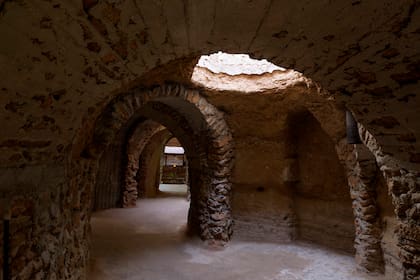 Forestiere Underground Gardens Located at 5021 West Shaw Avenue in Fresno, California are an unusual manmade creation built by Baldasare Forestiere, an immigrant from Sicily, over a period of 40 years from 1906 to until his death in 1946. It is operated by members of the Forestiere family through the Forestiere Historical Center, and can be considered a spectacular and unconventional example of vernacular architecture.
The catalyst for the construction of the underground abode was a result of the hot summers typical of the Fresno area. The inspiration lends itself to ancient Roman catacombs that Baldasare was infatuated with in his youth. Countless hours were spent excavating the hardpan layer that cements much of Fresnos soil to create his underground home. It had a summer bedroom, a winter bedroom, a bath, a functional kitchen, a fish pond, and a parlor with a fireplace.Interspersed amongst the beautiful stone walls and archways are grottoes and courtyards that allow for pockets of light. The intricate pathways were created section by section, over a span of 10 acres, without the aid of blueprints.