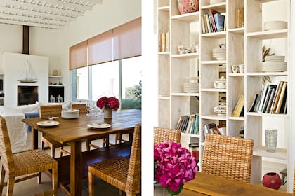 Para contrarrestar el blanco, cortinas de mimbre en color tostado. El mueble que marca una división sutil con su trama semitransparente y los de la cocina son obra del Estudio.