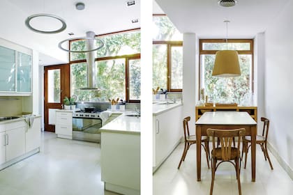 En sintonía con la calidez de las aberturas de madera, el comedor diario con clásicas sillas Thonet.