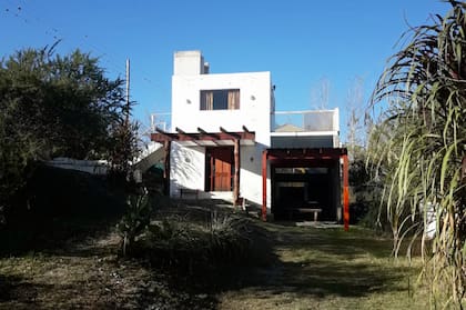 Frente de una de las cabañas, en Villa Carlos Paz.