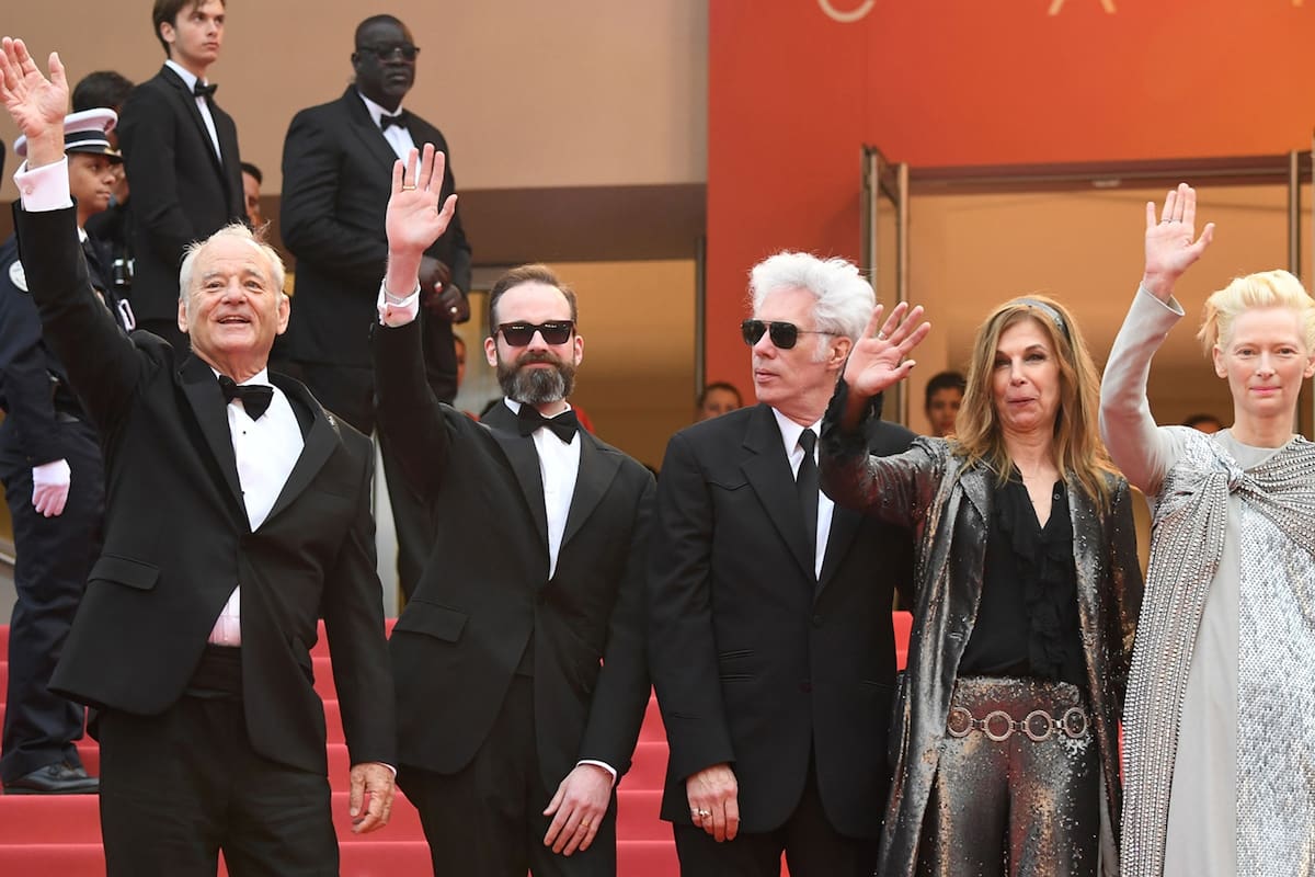 (From L) US actor and comedian Bill Murray, Producer Carter Logan, US film director, screenwriter and actor Jim Jarmusch, his partner US actress and film director Sara Driver and British actress and model Tilda Swinton wave as they arrive for the screening of the film "The Dead Dont Die" d
