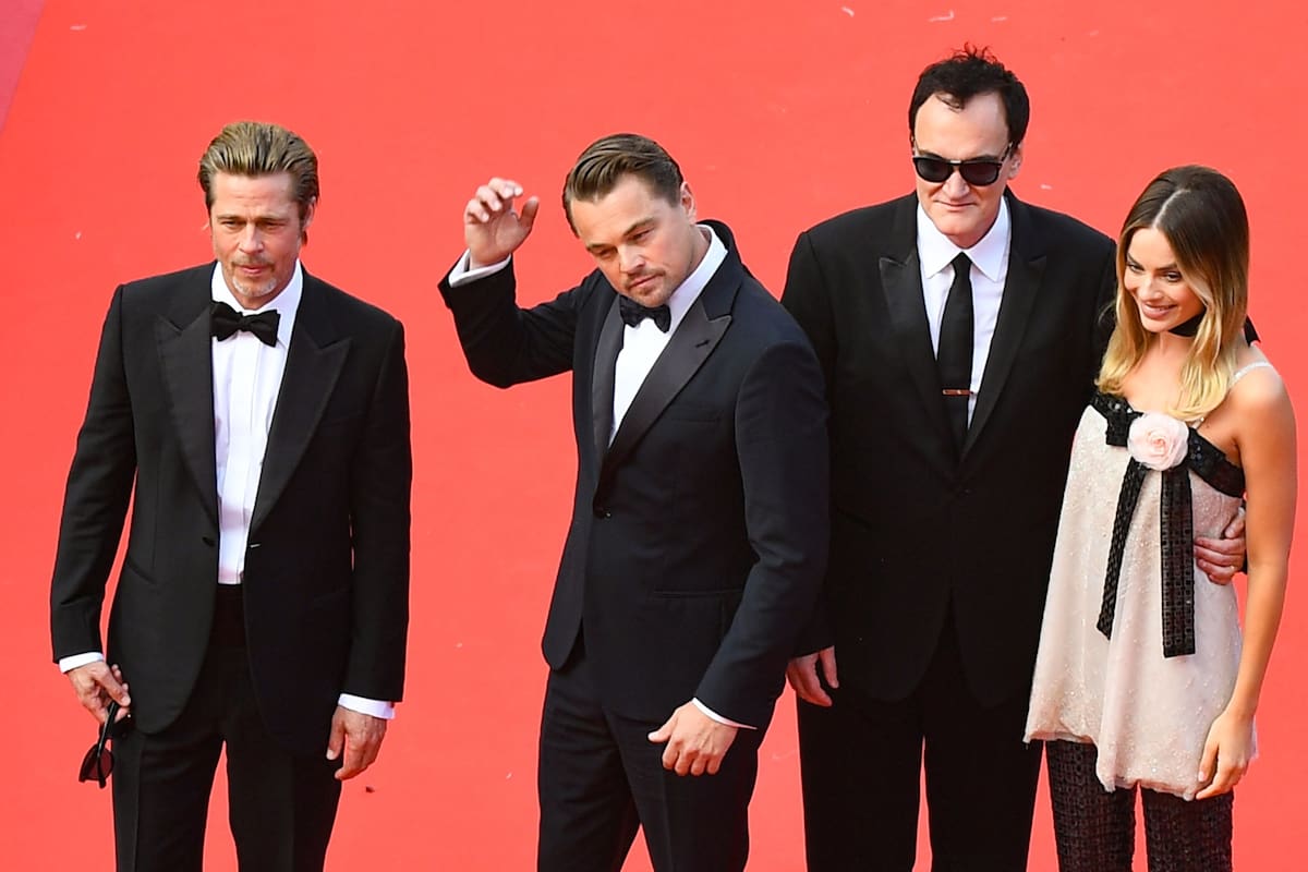 (From R) Australian actress Margot Robbie, US film director, screenwriter, producer, and actor Quentin Tarantino, US actor Leonardo DiCaprio and US actor Brad Pitt pose as they arrive for the screening of the film "Once Upon a Time... in Hollywood" at the 72nd edition of the Cannes Film Fe