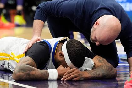 Gary Payton de Golden State abandona el partido contra Charlotte tras colisión con LaMelo Ball