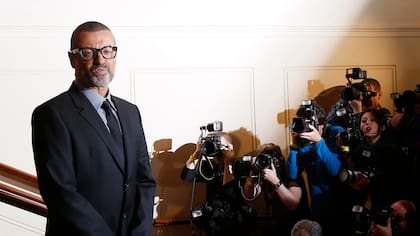George Michel ante los paparazzi
