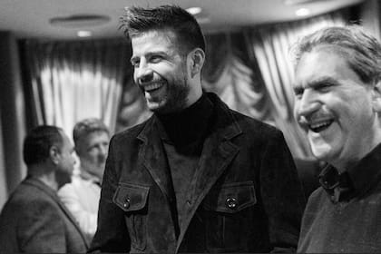 Gerard Pique y David Haggerty, presidente de ITF