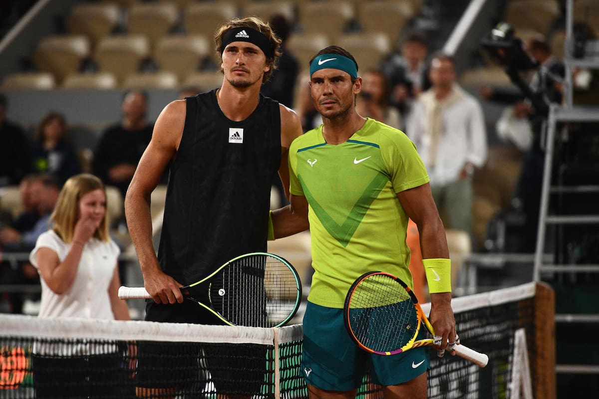 Germany's Alexander Zverev (L) and Spain's Rafael Nadal pose prior to their men's semi-final match on day 13 of the Roland-Garros Open tennis tournament at the Court Philippe-Chatrier in Paris on June 3, 2022. (Photo by Christophe ARCHAMBAULT / AFP)