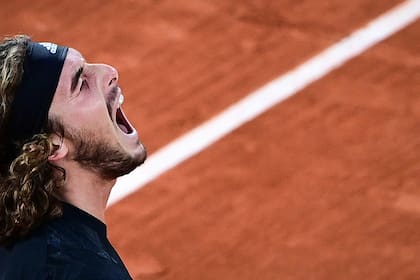 Greeces Stefanos Tsitsipas reacts as he plays against Serbias Novak Djokovic during their mens singles semi-final tennis match on Day 13 of The Roland Garros 2020 French Open tennis tournament in Paris on October 9, 2020.