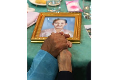 En el encuentro las familias intercambiaron fotografías familiares
