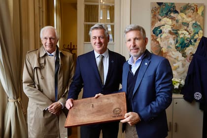 Guillermo Bernaudo, ministro de Desarrollo Económico; Nicolás Pino, presidente de la SRA; y Rogelio Frigerio, gobernador de Entre Ríos