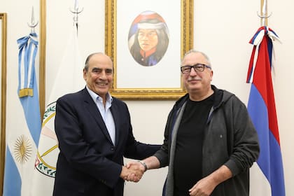 Guillermo Francos y Hugo Passalacqua, durante la reunión que mantuvieron en mayo