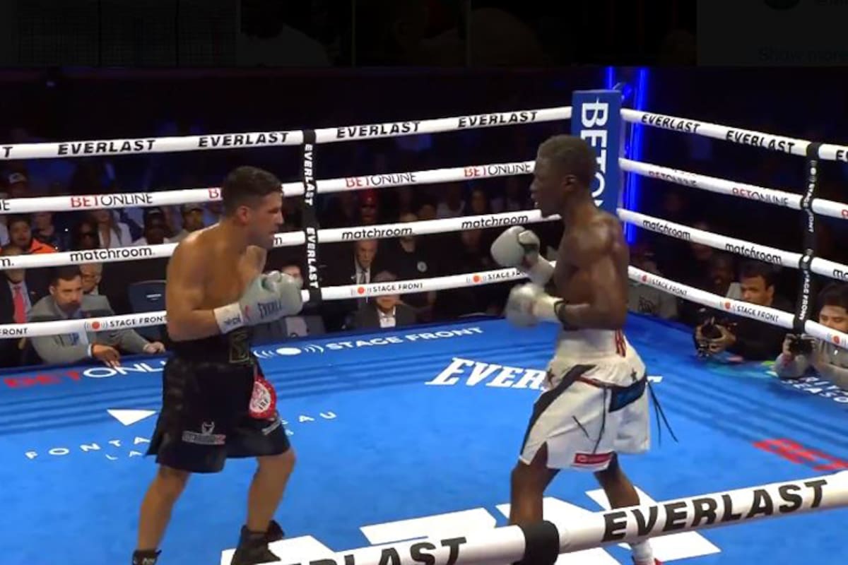 Gustavo Lemos y Richardson Hitchins, durante el combate