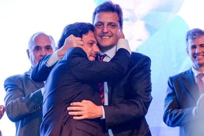 Gustavo Sáenz y Sergio Massa