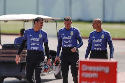 Guzmán, Armani y Caballero en el entrenamiento de hoy