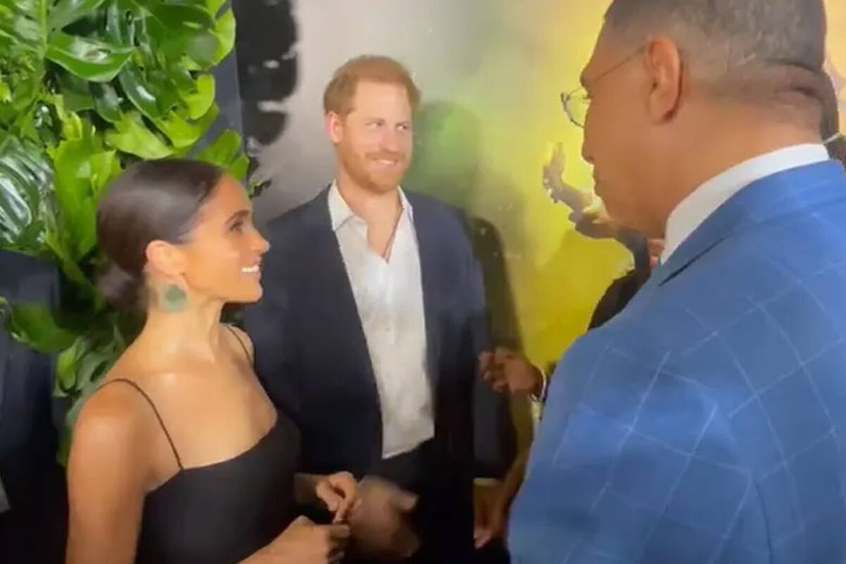 Harry y Meghan junto al primer ministro de Jamaica, Andrew Holness
