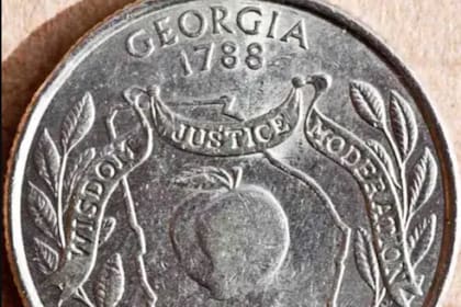 Hay monedas de 25 centavos de Georgia, de 1999, que podrian valer mucho más