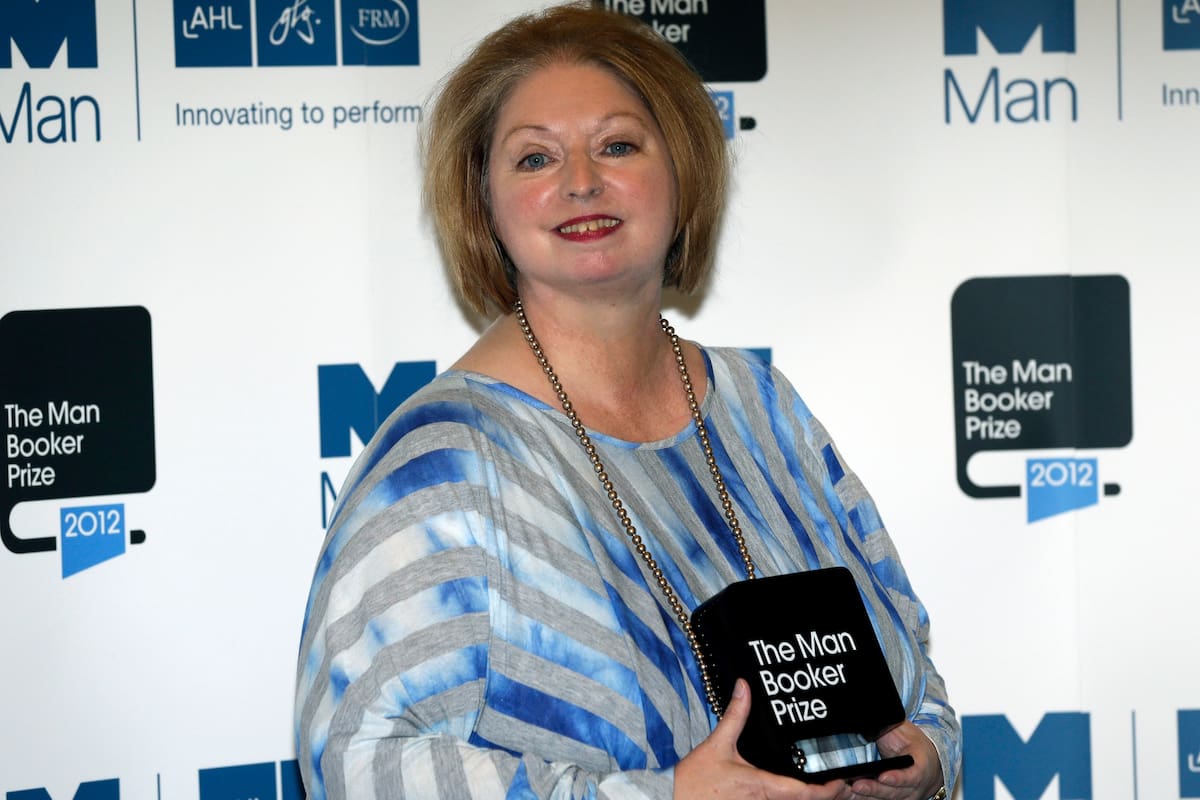 Hilary Mantel, winner of the Man Booker Prize for Fiction, poses with her prize for the photographers shortly after the award ceremony in central London. Mantel and American author Anne Tyler are among 13 writers on a U.S.-dominated list of contenders for the prestigious Booker Prize for fiction. Ma