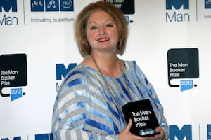 Hilary Mantel, winner of the Man Booker Prize for Fiction, poses with her prize for the photographers shortly after the award ceremony in central London. Mantel and American author Anne Tyler are among 13 writers on a U.S.-dominated list of contenders for the prestigious Booker Prize for fiction. Ma
