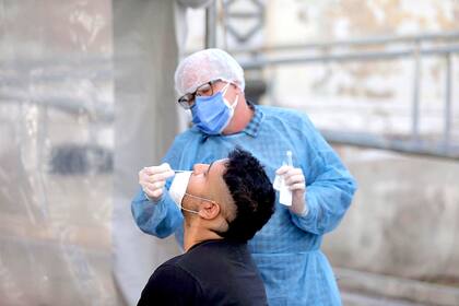 Hisopados en el Barrio General Paz en Córdoba. Foto de archivo.