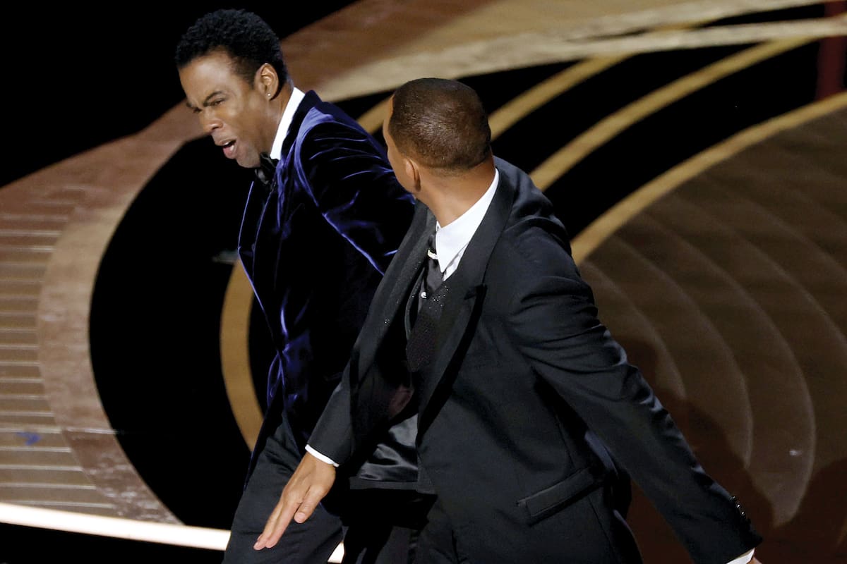 HOLLYWOOD, CALIFORNIA - MARCH 27: Will Smith appears to slap Chris Rock onstage during the 94th Annual Academy Awards at Dolby Theatre on March 27, 2022 in Hollywood, California. (Photo by Neilson Barnard/Getty Images)