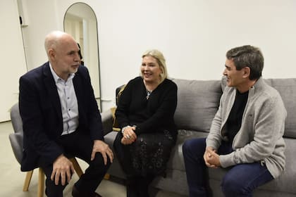Horacio Rodríguez Larreta, Elisa Carrió y Fernán Quirós