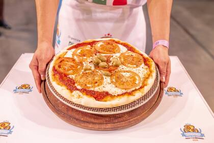 Hoy se celebra "La noche de la pizza y la empanada", un evento que homenajea a dos platos emblemáticos argentinos y nuclea a más de 4000 locales en todo el país