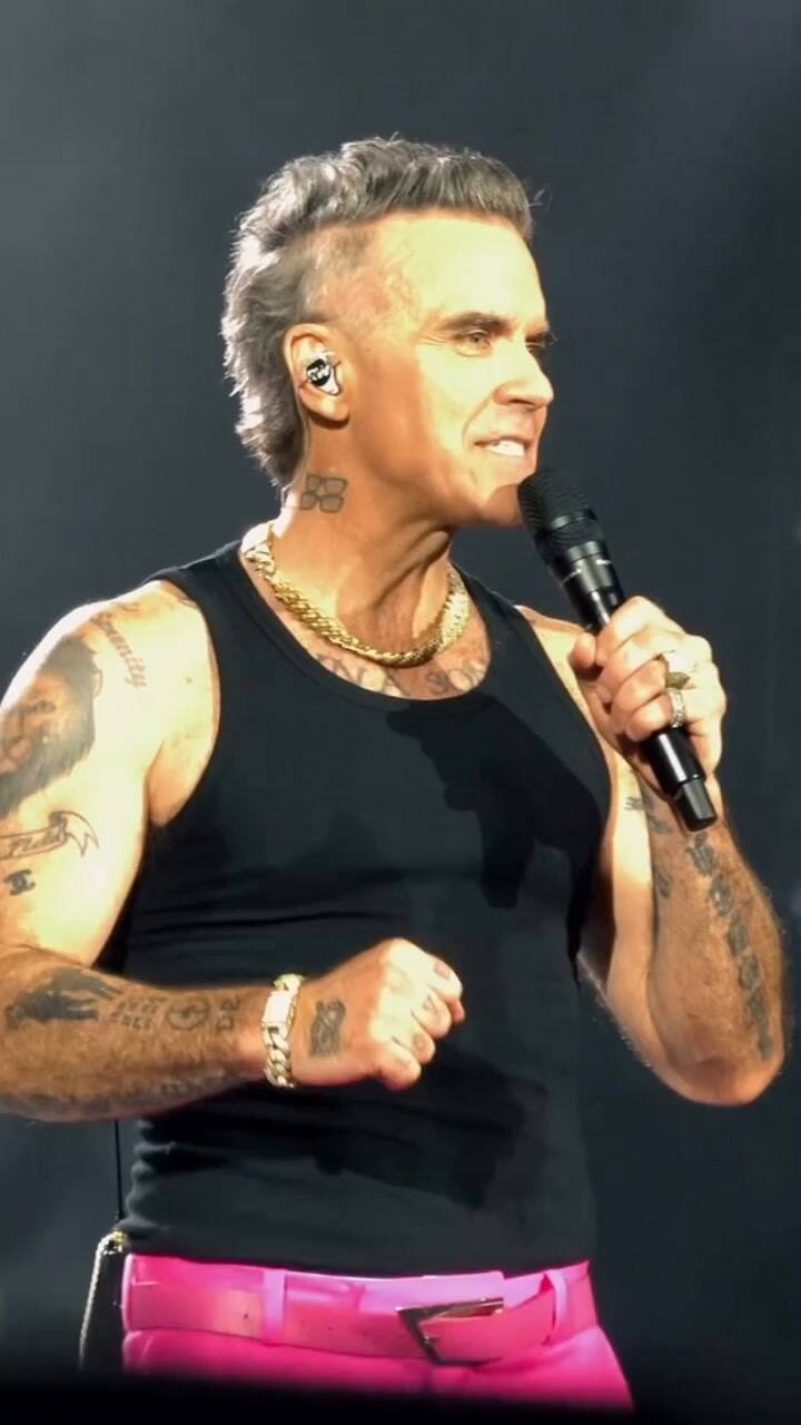 Robbie Williams apoyó a Lionel Messi durante su show en Bélgica