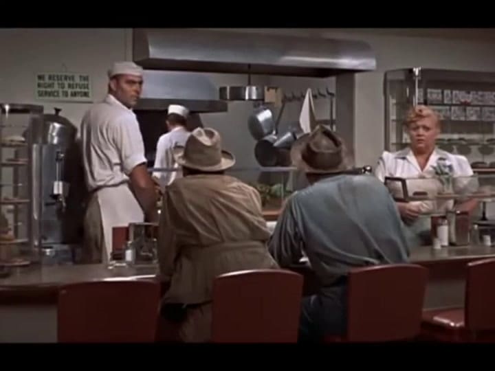 Escena de la película Gigante, con Rock Hudson y Elizabeth Taylor - Fuente: YouTube