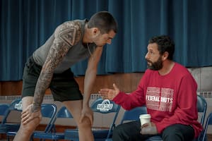 HUSTLE. (L-R) Juancho Hernangomez as Bo Cruz and Adam Sandler as Stanley Sugerman in Hustle. Cr. Scott Yamano/Netflix © 2022.