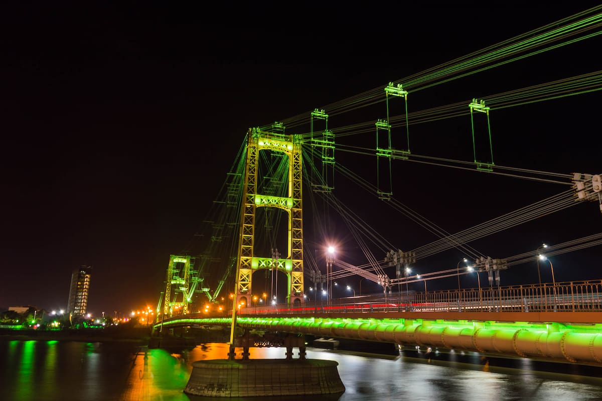 Illuminated suspension bridge, Santa Fe, Argentina.