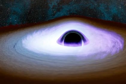 Ilustración de material girando alrededor de un agujero negro y su corona (Archivo)