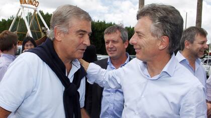 Oscar Aguad y Mauricio Macri cuando fueron imputados por el acuerdo con el Correo Argentino, antes de que la causa pase a la Justicia porteña