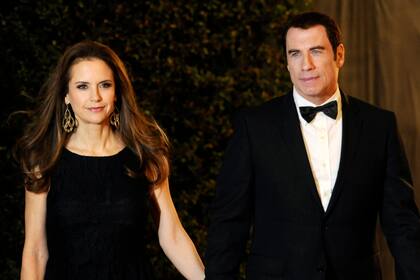 In this Nov. 12, 2011, file photo, Actress Kelly Preston, left and her husband John Travolta arrive at the Academy of Motion Picture Arts and Sciences 2011 Governors Awards, in Los Angeles. Actress Kelly Preston, whose credits included the films “Twins†and “Jerry Maguire,†died Sunday, July