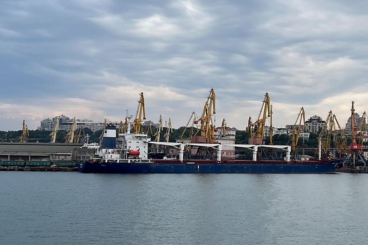 In this photo provided by the Ukrainian Infrastructure Ministry Press Office, the Razoni cargo ship, under the flag of Sierra Leone, with 26,000 tons of the Ukrainian corn aboard, leaves the port in Odesa region, Ukraine, Monday, Aug. 1, 2022. The first ship carrying Ukrainian grain set off from the port of Odesa on Monday under an internationally brokered deal and is expected to reach Istanbul on Tuesday, where it will be inspected, before being allowed to proceed. (Ukrainian Infrastucture Ministry Press Office via AP)