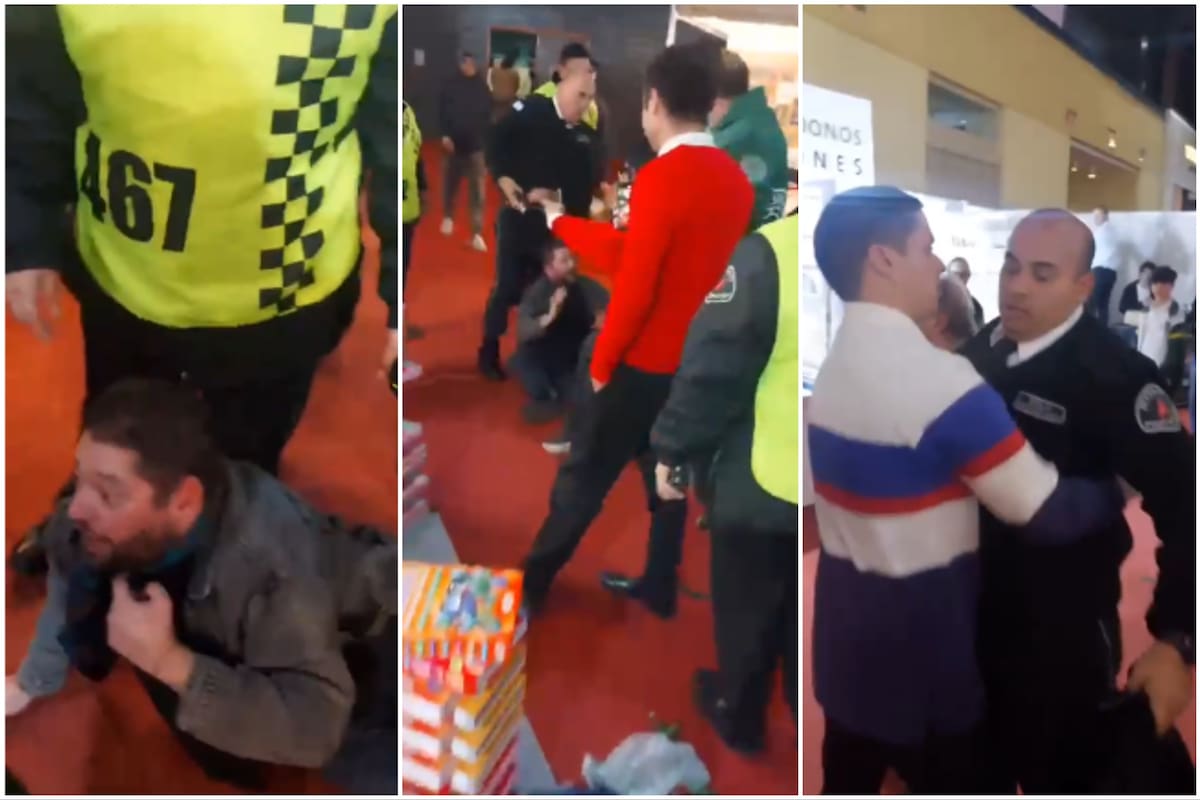 Incidentes en la Feria del Libro entre editores y personal de seguridad; en el piso, el escritor, músico y editor de Mansalva, Francisco Garamona