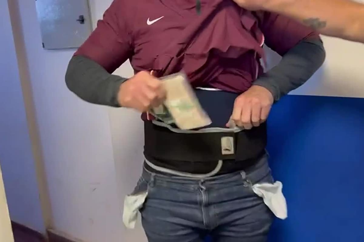 Intentó ingresar al país con 26 iPhone pegados al cuerpo