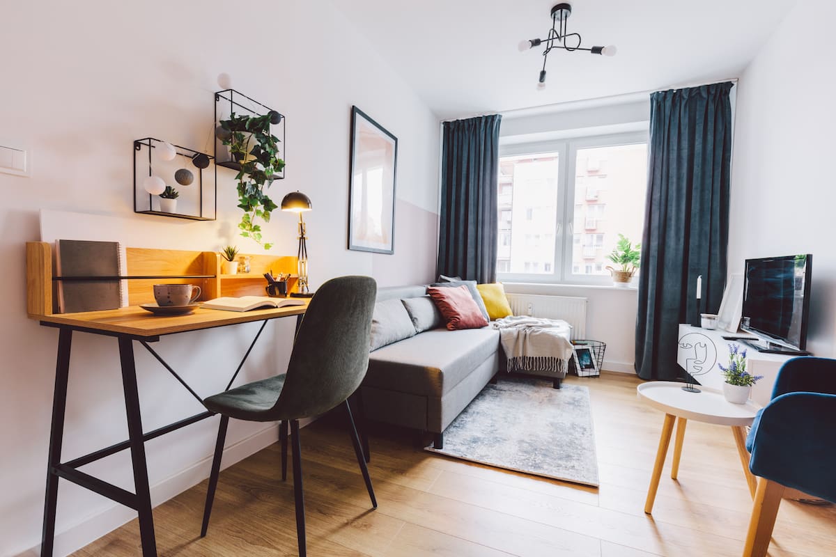 Interior of small apartment living room for home office. Real estate rent and home staging