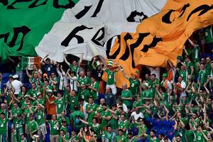 Ireland supporters cheer ahead the Euro 2016 round of 16 football match between France and Republic of Ireland at the Parc Olympique Lyonnais stadium in Décines-Charpieu, near Lyon, on June 26, 2016.