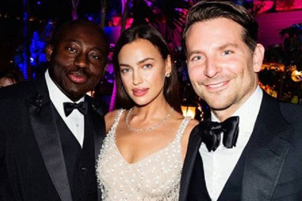 Irina Shayk y Bradley Cooper, junto al editor de la publicación británica de Vogue, Edward Enninfuld