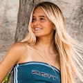 Tiene 14 años, es hija de un exarquero de Primera y una modelo y se aseguró una medalla de plata en Playa Grande