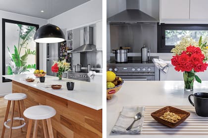 Isla central con base de madera recubierta con roble de Eslavonia (Patagonia Flooring) y tapa de silestone blanca. Alacenas y muebles bajo mesada de madera laqueada brillante; mesada de Corian. Piso prefinished con tratamiento de hidrolaqueado.
