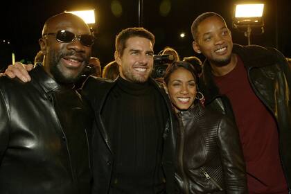 Jada Pinkett Smith y Will Smith junto a Tom Cruise, en el estreno de la película El último samurai