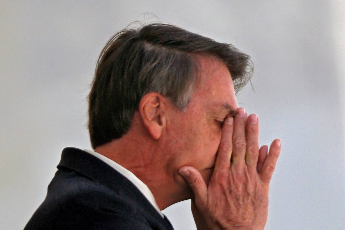 Jair Bolsonaro en la puerta del Palacio Planalto